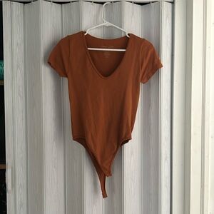 Short sleeve orange body suit